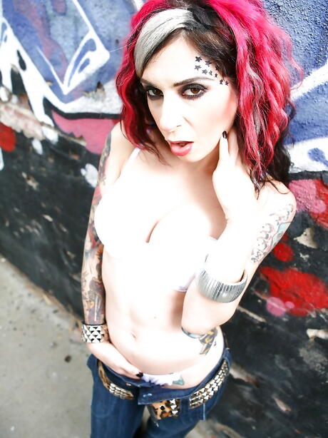 Alluring american red-haired milf Joanna Angel reveals big boobies and hot butt 