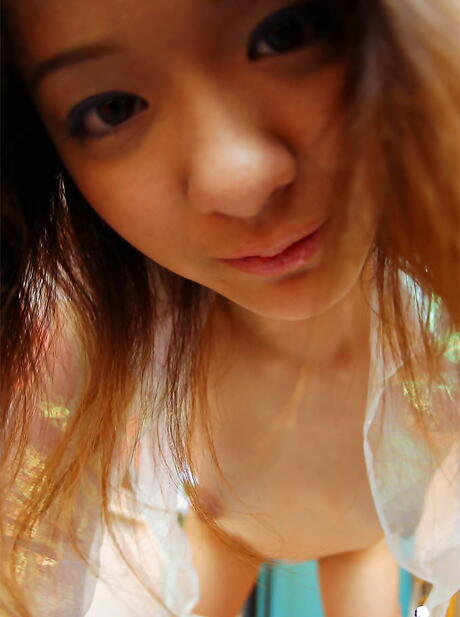 Sexy japanese teen Izumi in hot undies shows tiny tits and spreads her legs 